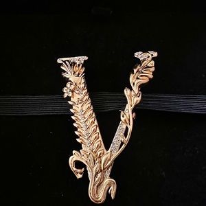 Versace brooch